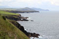 View of cliffs & water on loop road around Dingle Peninsula. Ireland.
