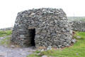 Beehive hut reconstructed on Dingle Peninsula. Ireland.