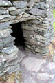 Entrance to beehive hut on Dingle Peninsula. Ireland.