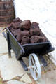 Cart carrying peat for heating at Muckross Traditional Farms in Killarney National Park. Killarney, Ireland