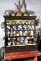 Cupboard with family tableware at Quille's farm at Muckross Traditional Farms in Killarney National Park. Killarney, Ireland.