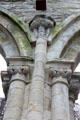 Pillars with carvings of church nave at Boyle Abbey. Knocknashee, Ireland.
