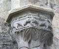 Carved nave corbel with three dogs or cats fighting at Boyle Abbey. Knocknashee, Ireland.