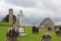 O'Rourke's Round tower over Celtic crosses at Clonmacnoise. Ireland.