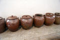 Ceramic brown stoneware storage jugs at Strokestown Park. Vesnoy, Ireland.