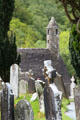 St Kevin's Church over tombstones at Glendalough. Ireland.