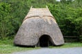 Recreation of Neolithic straw house at Irish National Heritage Park. Ireland.
