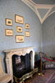 Fireplace in blue bedroom at Kilkenny Castle. Ireland.