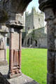 Transept tower seen through arches of cloister at Jerpoint Abbey. Ireland.