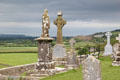 Grave monuments overlooking countryside at Rock of Cashel. Cashel, Ireland.