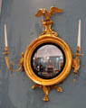Convex mirror with candles & eagle at Bishop's Palace. Waterford, Ireland.