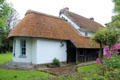 Thatched roof two story home. Adare, Ireland.