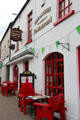 The Arches red trimmed restaurant on Main Street. Adare, Ireland.