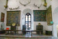 High table in Great Hall with extinct Irish deer antlers at Bunratty Castle. County Clare, Ireland.