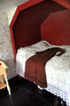 Inset bed in Shannon Farmhouse at Bunratty Castle & Folk Park. County Clare, Ireland.