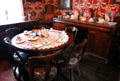 Dining table & sideboard in Golden Vale Farmhouse at Bunratty Castle & Folk Park. County Clare, Ireland.