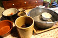 Kitchen bowls in Golden Vale Farmhouse at Bunratty Castle & Folk Park. County Clare, Ireland.