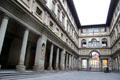 Uffizi Gallery facade which faces the street-like plaza which runs between the Arno River & Piazza della Signoria. Florence, Italy.
