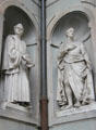Statues of F. Guicciardini & Amerigo Vespucci in exterior niches of Uffizi Gallery. Florence, Italy.