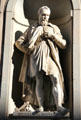 Statue of Michelangelo Buonarroti in exterior niche of Uffizi Gallery. Florence, Italy.