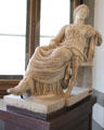 Roman-era copy of statue of seated woman after Attic Greek original at Uffizi Gallery. Florence, Italy.