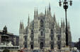 Duomo or Cathedral facade with ornate spires. Milan, Italy.