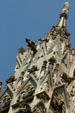 View of corner tower of Duomo. Milan, Italy.