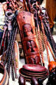 Carved walking sticks & wooden art at a crafts market near Nairobi. Kenya.