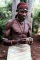 An African models his traditional dress in Bomas near Nairobi. Kenya.