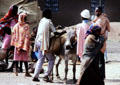 Kenyan country village scene with donkey. Kenya.