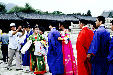 Japanese tourists dress in formal Korean wear at Kyongbok Palace, Seoul. South Korea.