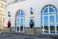 Two of several richly colored vases contrasting white stone of Court building. Luxembourg, Luxembourg.