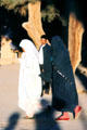 Women in traditional dress in El Kélàa des M'gouna. Morocco.