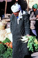 Vendor of root vegetables in souk. Erfoud, Morocco.