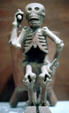 Skeleton sculpture from Oaxaca at National Museum of Anthropology. Mexico City, Mexico.