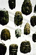 Stone masks hang on a wall in Taxco. Mexico