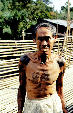 Tattoos of an old warrior from Ugat longhouse in Sarawak. Malaysia.