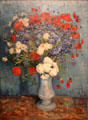 Vase with cornflowers & poppies painting by Vincent van Gogh at Van Gogh Museum. Amsterdam, NL.