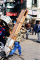 Wood carrier on streets of Katmandu. Nepal.