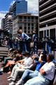 People enjoying the sun at Ferry building. Auckland, New Zealand.