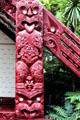 Maori carvings from the Meeting House in Waitangi in a culture where tongues protruded to scare enemies. New Zealand.