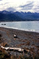 Kaikoura beach and mountains in the distance. New Zealand.