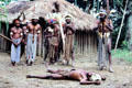 Acting out warfare at Chimbu village. Papua New Guinea.