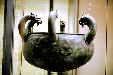 Etruscan bronze bowl with six animal heads in Vatican Museum. Vatican City.