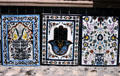 Tile murals with Tunisian themes in shop. Sousse, Tunisia.