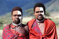 Masai tribesmen in traditional dress & face painting in Ngorongoro Park. Tanzania.