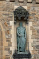 Statue of knight flanking entrance gateway of Edinburgh Castle. Edinburgh, Scotland.
