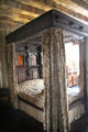 Four poster canopy bed in painted chamber at Gladstone's Land tenement house. Edinburgh, Scotland