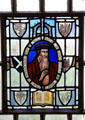 Image of Preacher John Knox on stained-glass window at John Knox House. Edinburgh, Scotland.