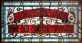 Empire Bar stained glass window sign at People's Story Museum. Edinburgh, Scotland.